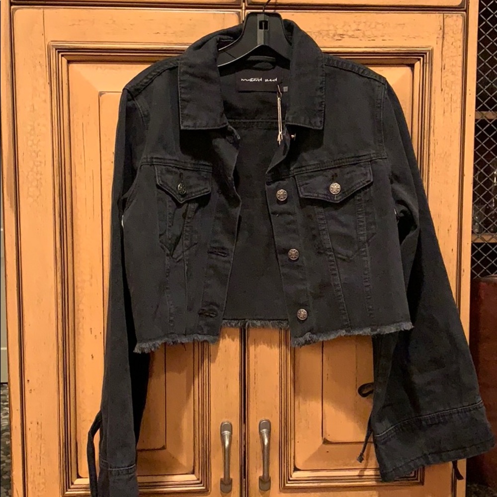 Black jean jacket with stripes down side